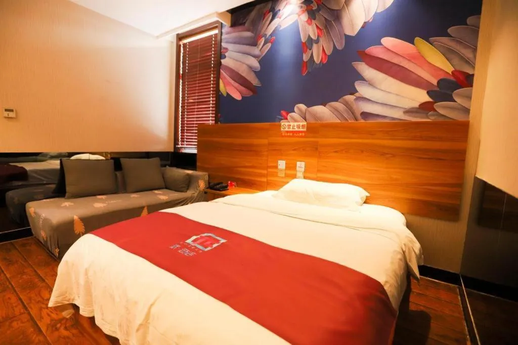 Bed in PAI Hotel Huayin Huashan Mountain Scenic Spot Ancient Street