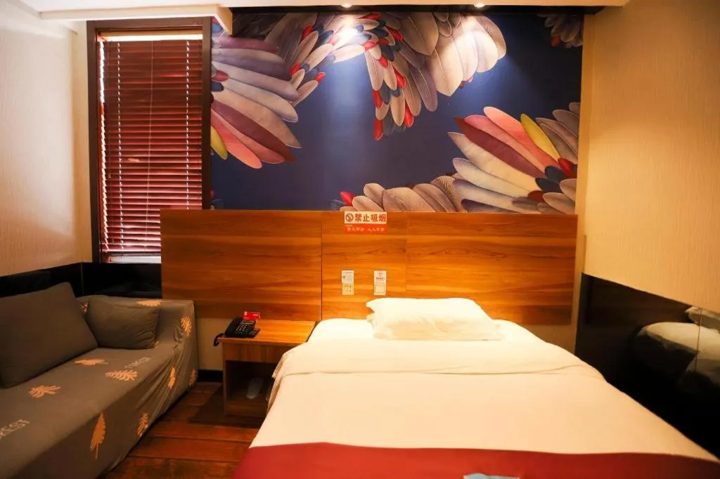 Bed in PAI Hotel Huayin Huashan Mountain Scenic Spot Ancient Street