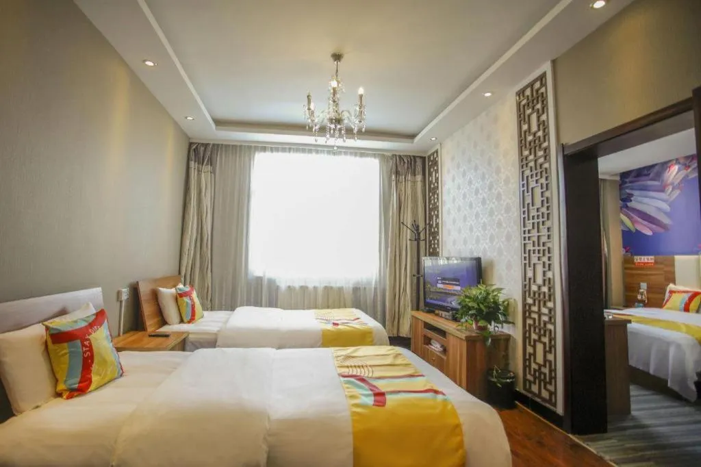 Bed in PAI Hotel Huayin Huashan Mountain Scenic Spot Ancient Street