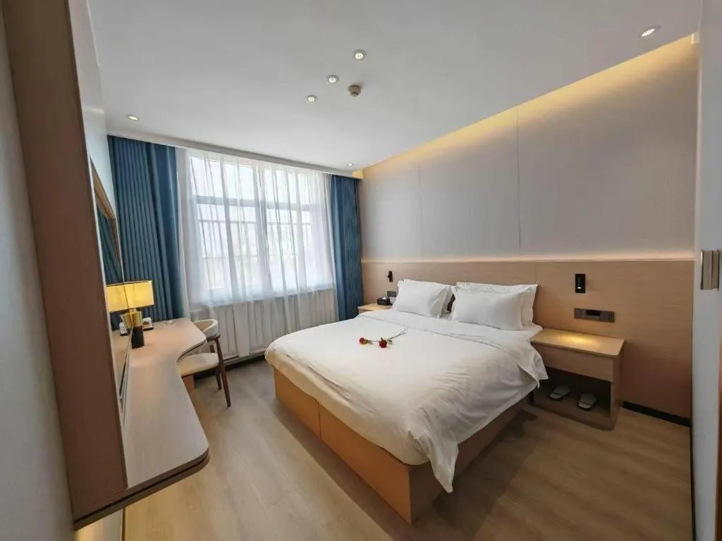 Bed in PAI Hotel Huayin Huashan Mountain Scenic Spot Ancient Street