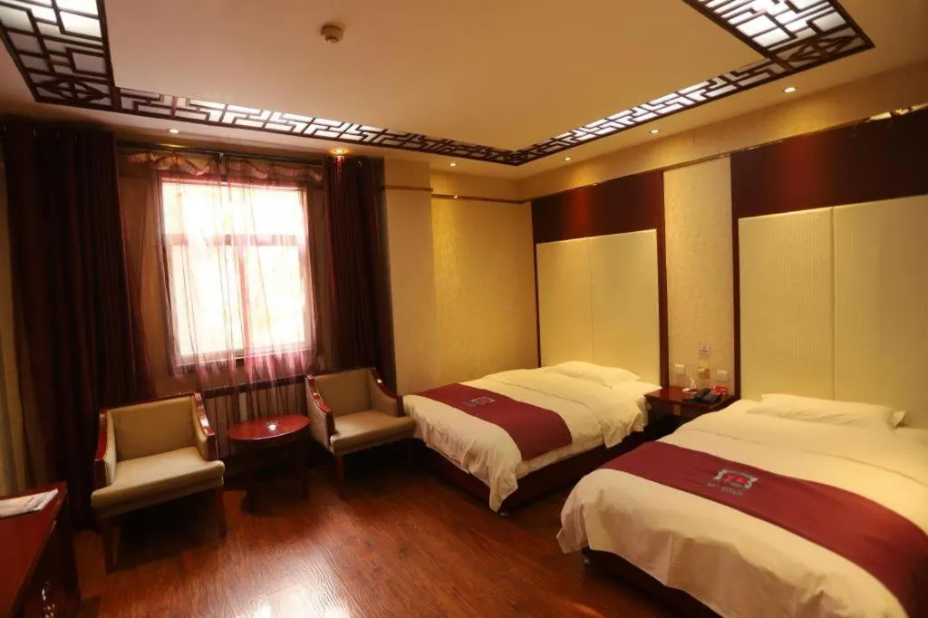 Bed in PAI Hotel Huayin Huashan Mountain Scenic Spot Ancient Street