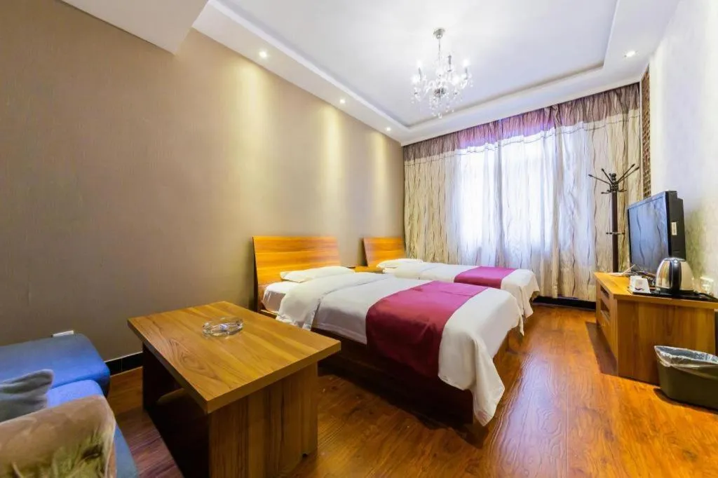 Bed in PAI Hotel Huayin Huashan Mountain Scenic Spot Ancient Street