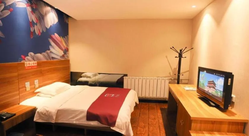 Bed in PAI Hotel Huayin Huashan Mountain Scenic Spot Ancient Street