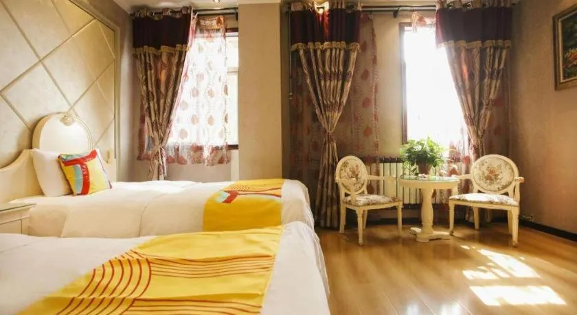 Bed in PAI Hotel Huayin Huashan Mountain Scenic Spot Ancient Street
