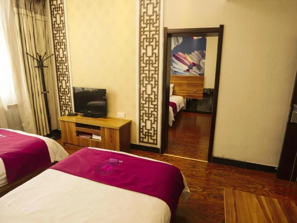 Bed in PAI Hotel Huayin Huashan Mountain Scenic Spot Ancient Street