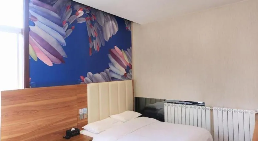 Bed in PAI Hotel Huayin Huashan Mountain Scenic Spot Ancient Street