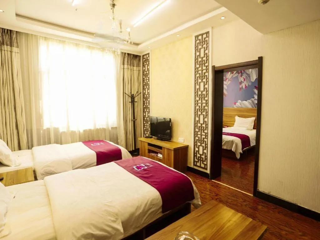 Bed in PAI Hotel Huayin Huashan Mountain Scenic Spot Ancient Street