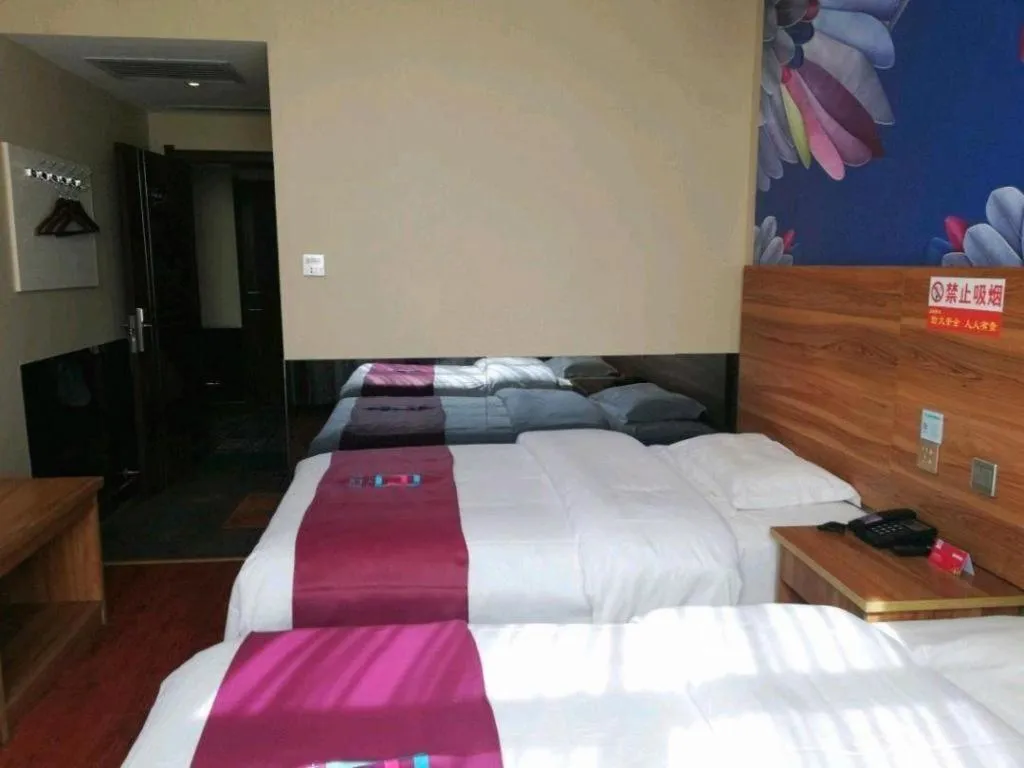Bed in PAI Hotel Huayin Huashan Mountain Scenic Spot Ancient Street