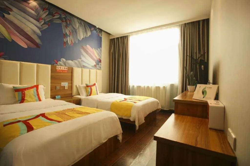 Bed in PAI Hotel Huayin Huashan Mountain Scenic Spot Ancient Street