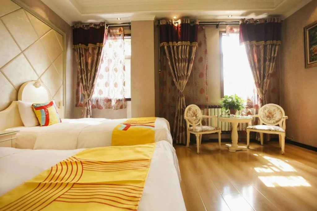 Bed in PAI Hotel Huayin Huashan Mountain Scenic Spot Ancient Street