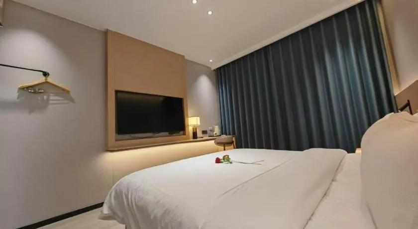 Bed in PAI Hotel Huayin Huashan Mountain Scenic Spot Ancient Street