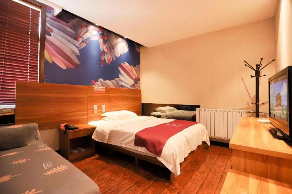 Bed in PAI Hotel Huayin Huashan Mountain Scenic Spot Ancient Street