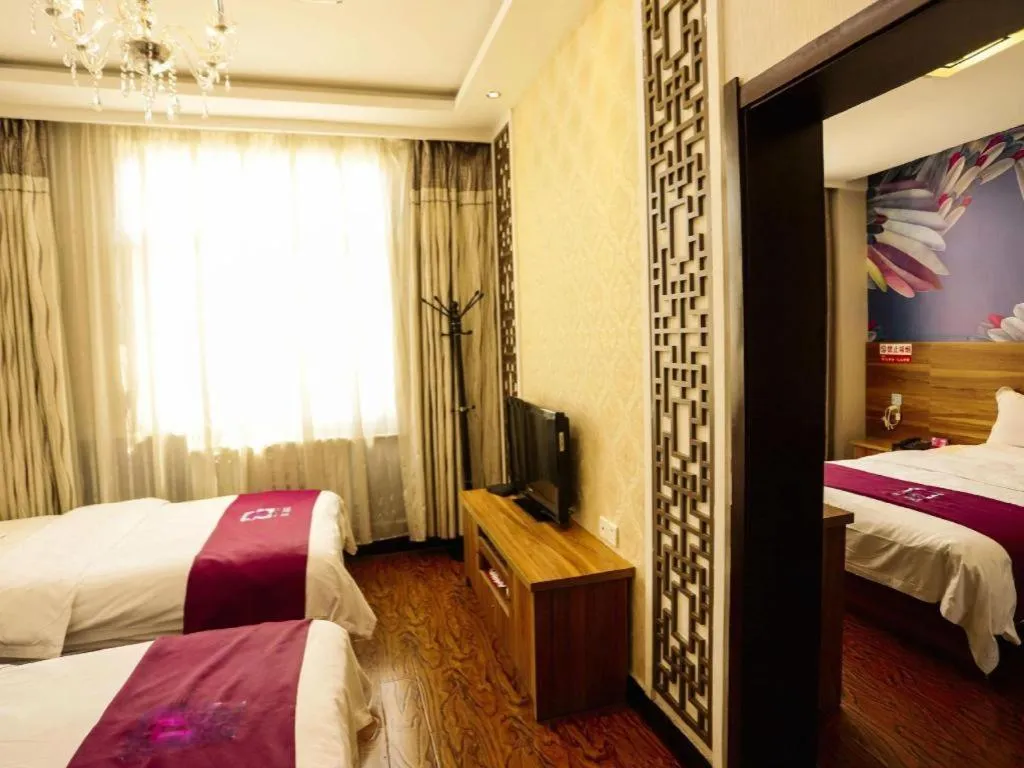 Bed in PAI Hotel Huayin Huashan Mountain Scenic Spot Ancient Street