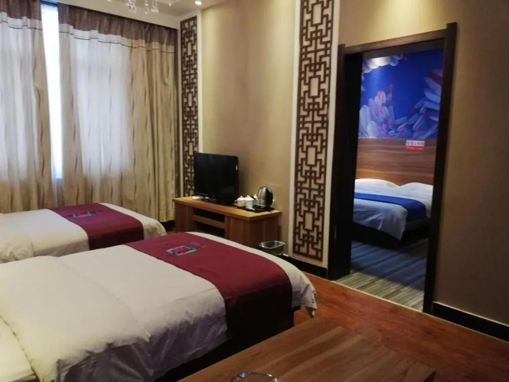 Bed in PAI Hotel Huayin Huashan Mountain Scenic Spot Ancient Street