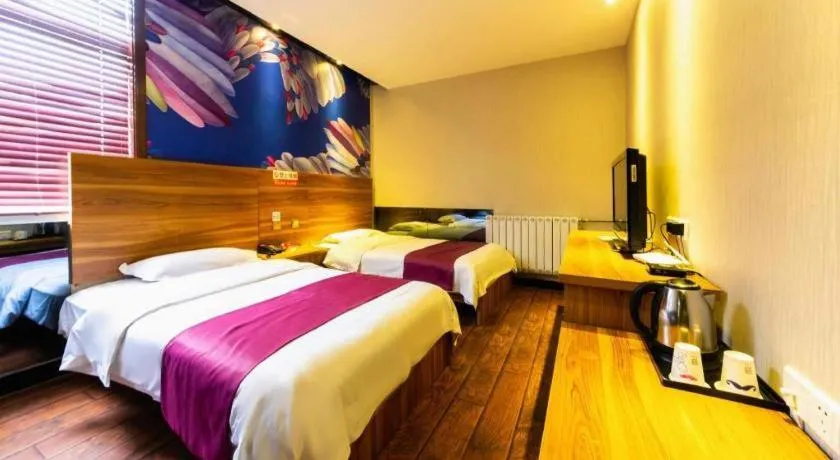 Bed in PAI Hotel Huayin Huashan Mountain Scenic Spot Ancient Street