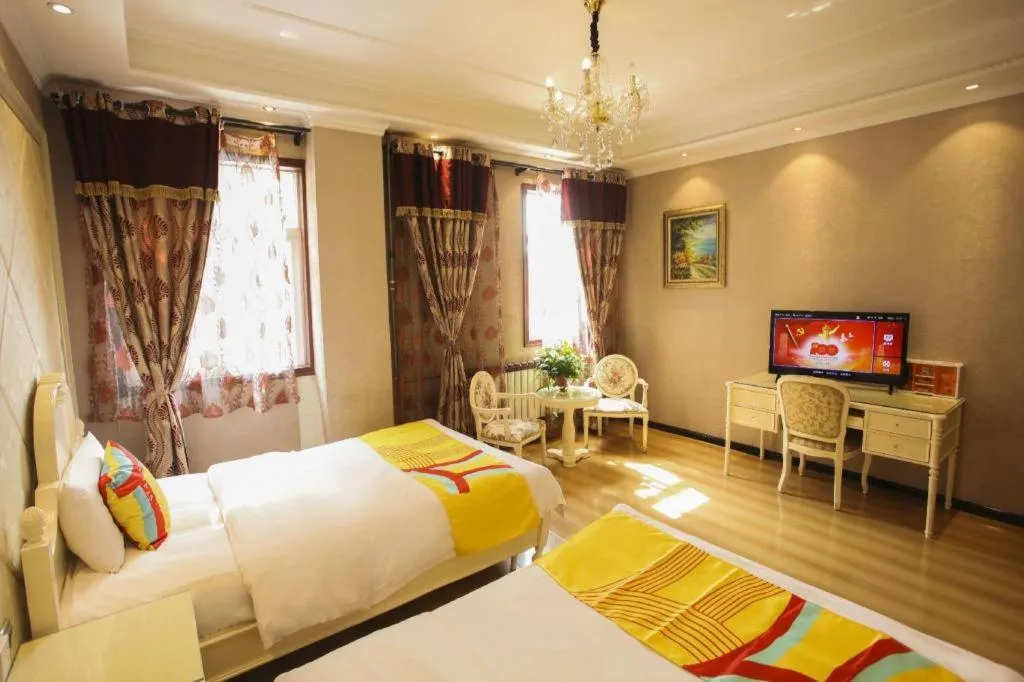 Bed in PAI Hotel Huayin Huashan Mountain Scenic Spot Ancient Street