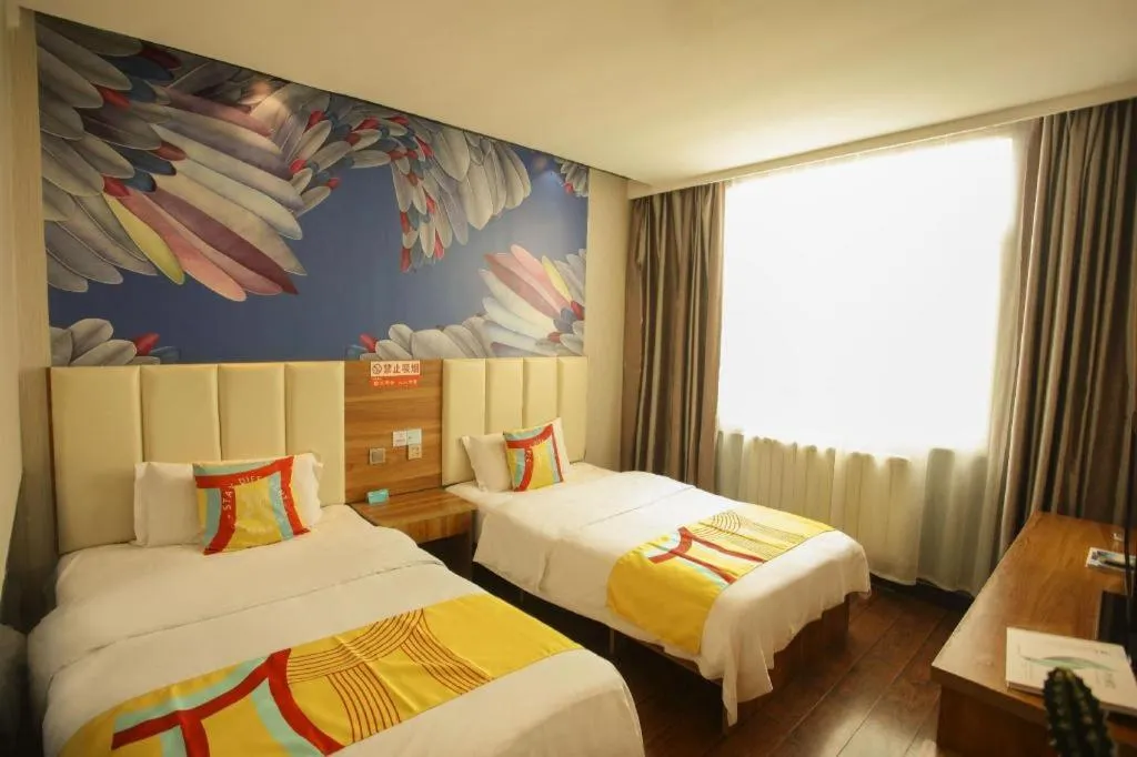 Bed in PAI Hotel Huayin Huashan Mountain Scenic Spot Ancient Street