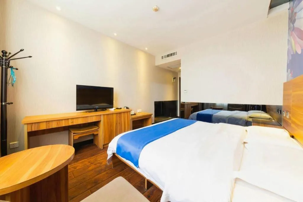 Bed in PAI Hotel Huayin Huashan Mountain Scenic Spot Ancient Street