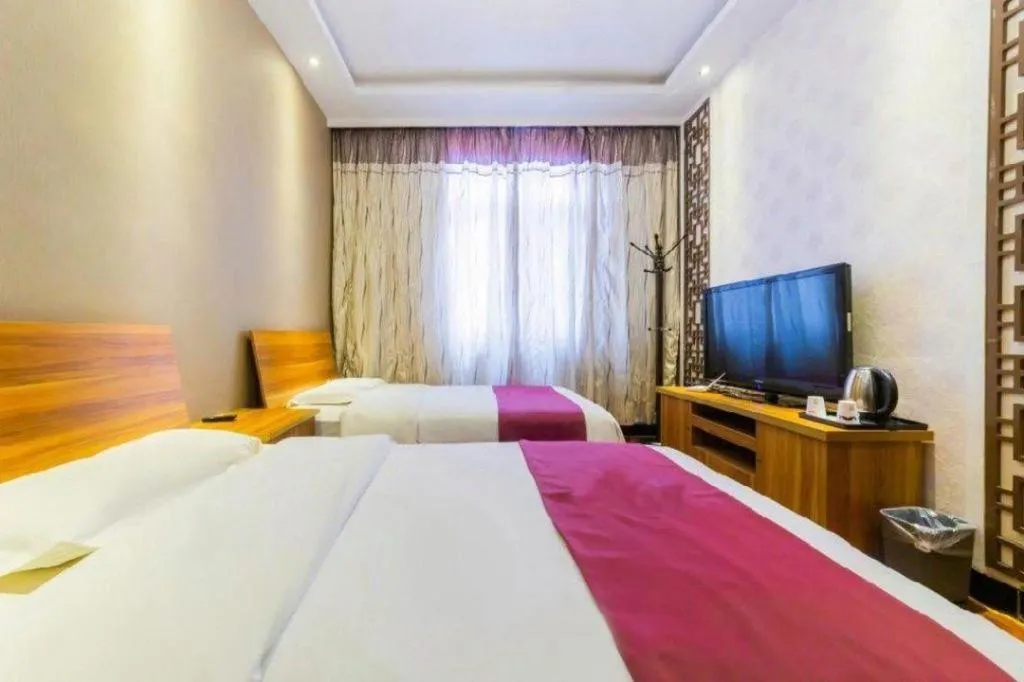 Bed in PAI Hotel Huayin Huashan Mountain Scenic Spot Ancient Street