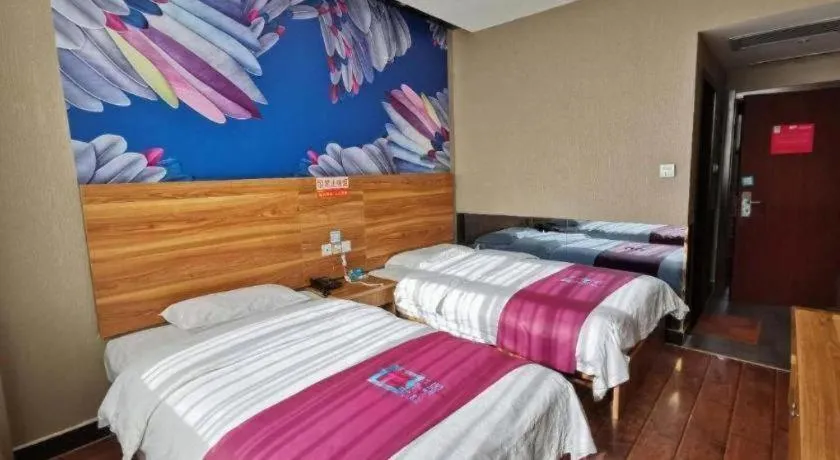 Bed in PAI Hotel Huayin Huashan Mountain Scenic Spot Ancient Street