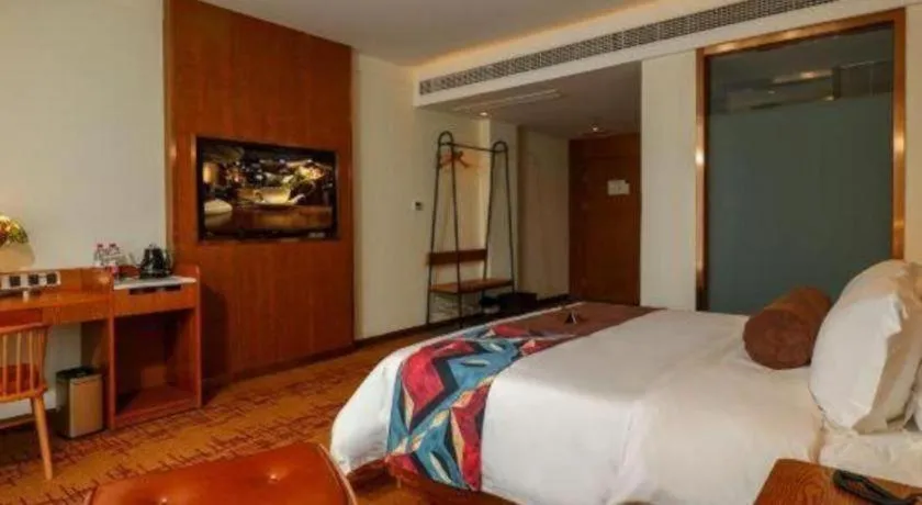 Bed in James Joyce Coffetel·Chadianzi Passenger Terminal Jinke Bei Road Metro Station