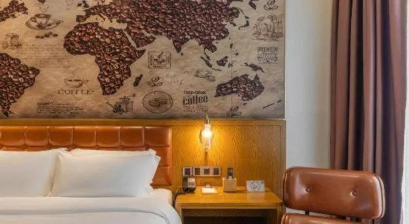 Bed in James Joyce Coffetel·Chadianzi Passenger Terminal Jinke Bei Road Metro Station