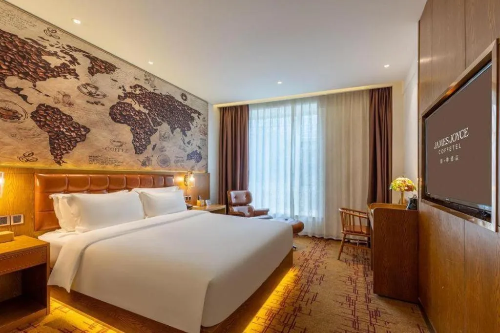 Bed in James Joyce Coffetel·Chadianzi Passenger Terminal Jinke Bei Road Metro Station