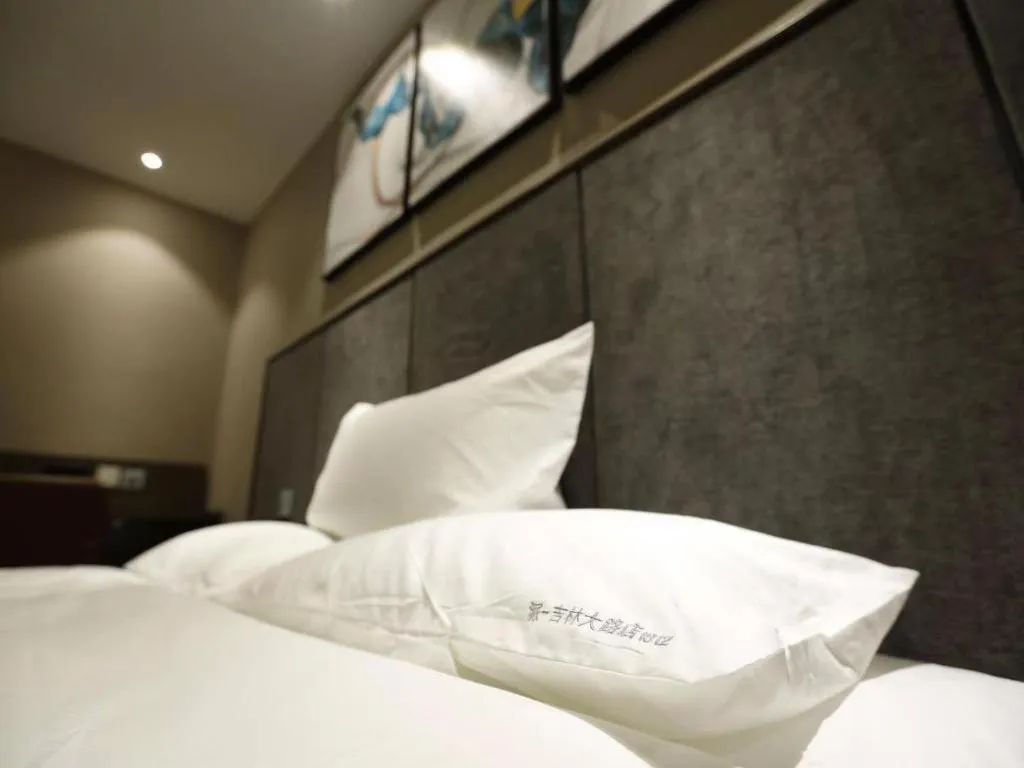 Bed in PAI Hotel·Changchun Jilin DaLu