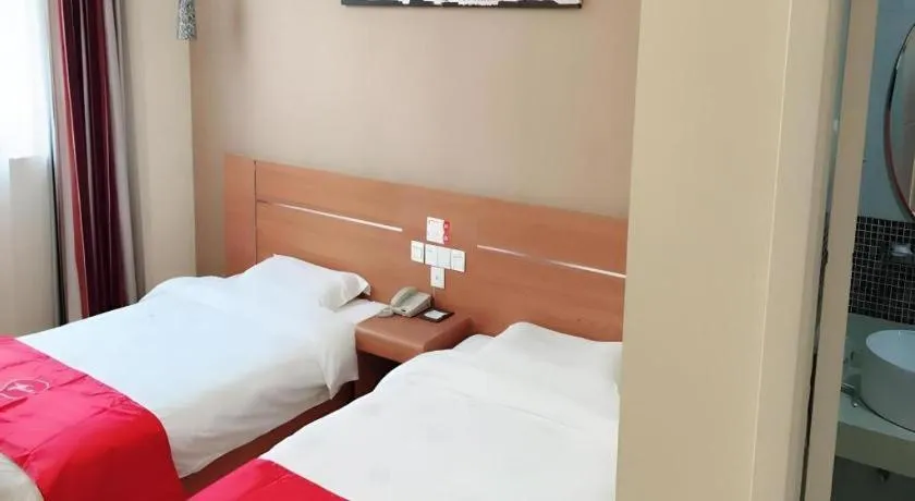 Bed in Thank Inn Plus Hotel Taizhou XingHua Anfeng county