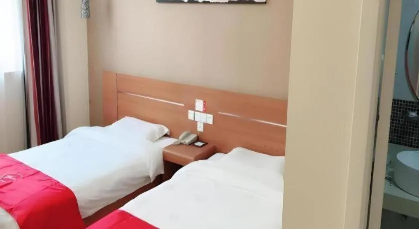 Bed in Thank Inn Plus Hotel Taizhou XingHua Anfeng county