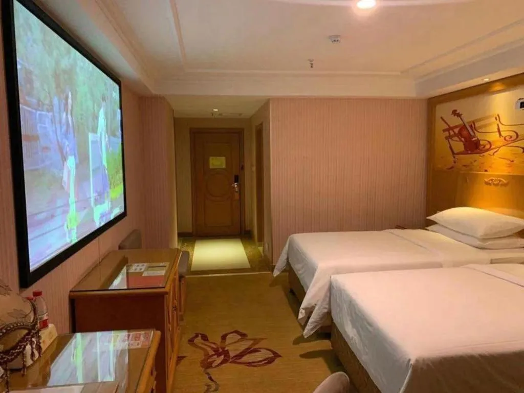 Bed in Vienna Hotel Inner Mongolia Hohhot Railway Station Gongzhufu Metro Station