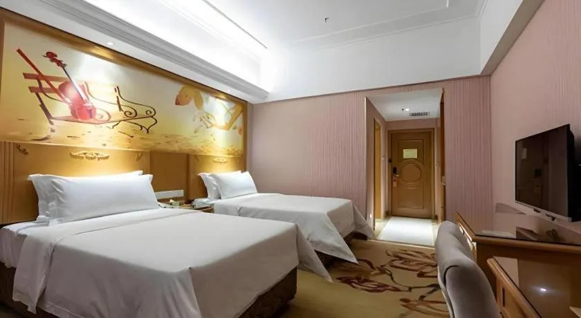 Bed in Vienna Hotel Inner Mongolia Hohhot Railway Station Gongzhufu Metro Station