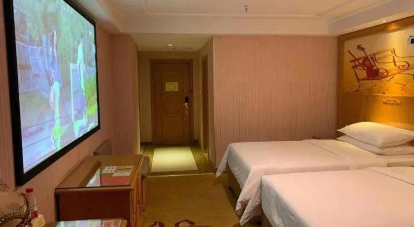 Bed in Vienna Hotel Inner Mongolia Hohhot Railway Station Gongzhufu Metro Station