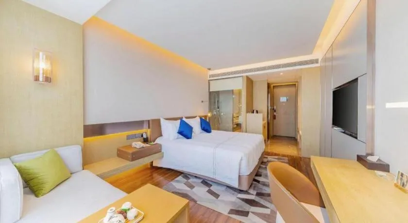 Bed in AUGUSTINE HOTEL