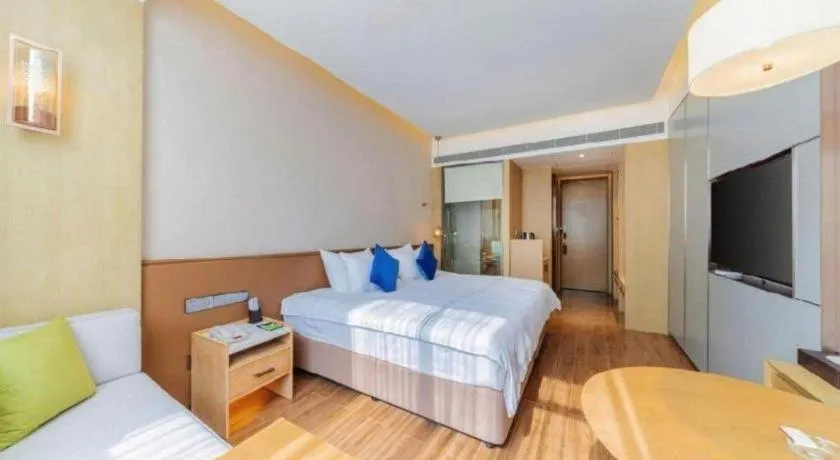 Bed in AUGUSTINE HOTEL