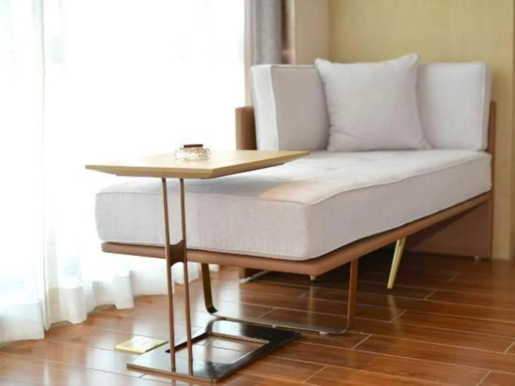 Bed in AUGUSTINE HOTEL