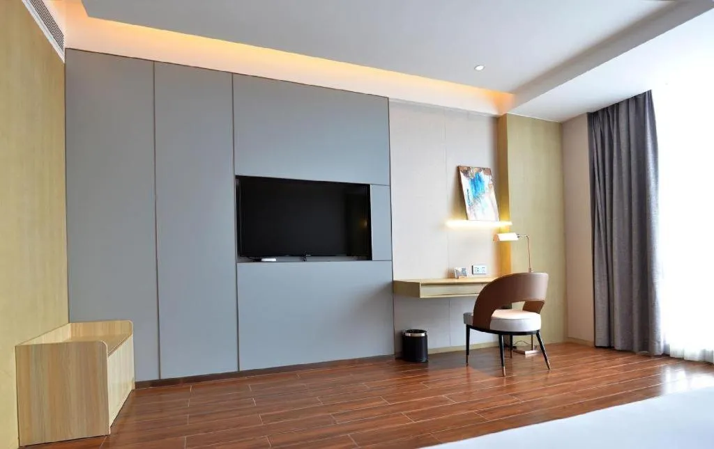 Bed in AUGUSTINE HOTEL