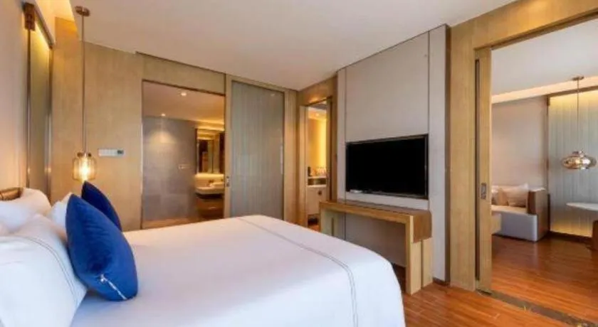 Bed in AUGUSTINE HOTEL