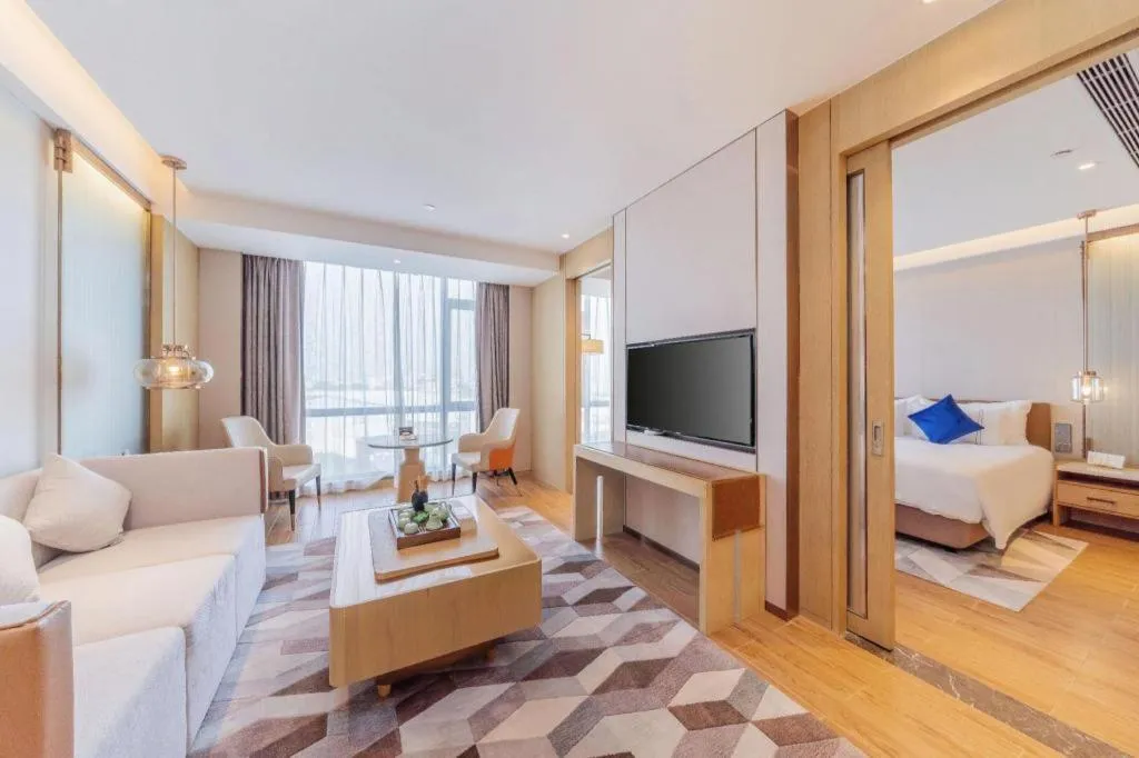 Bed in AUGUSTINE HOTEL