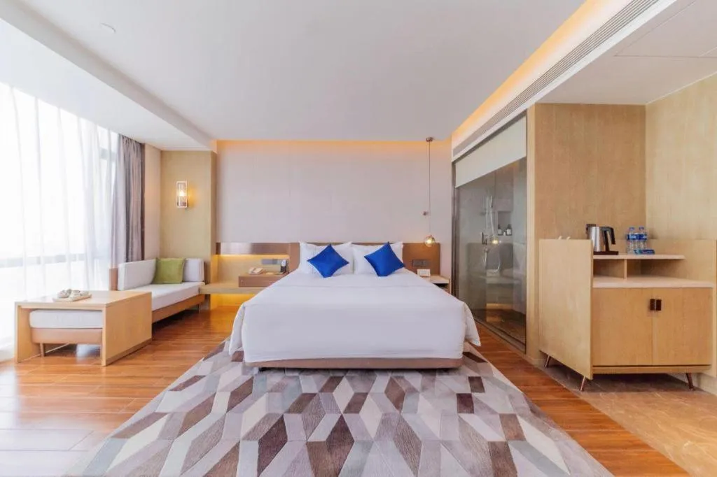 Bed in AUGUSTINE HOTEL