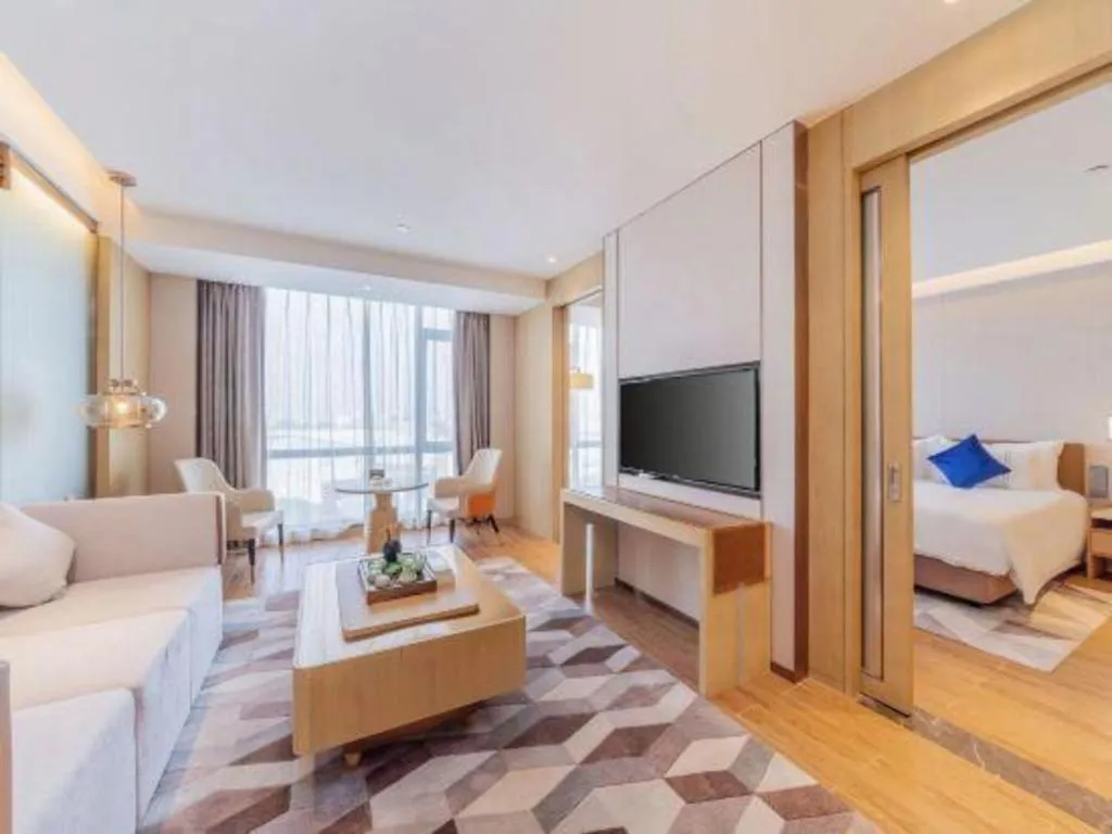 Bed in AUGUSTINE HOTEL