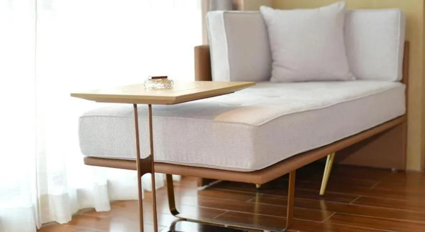 Bed in AUGUSTINE HOTEL