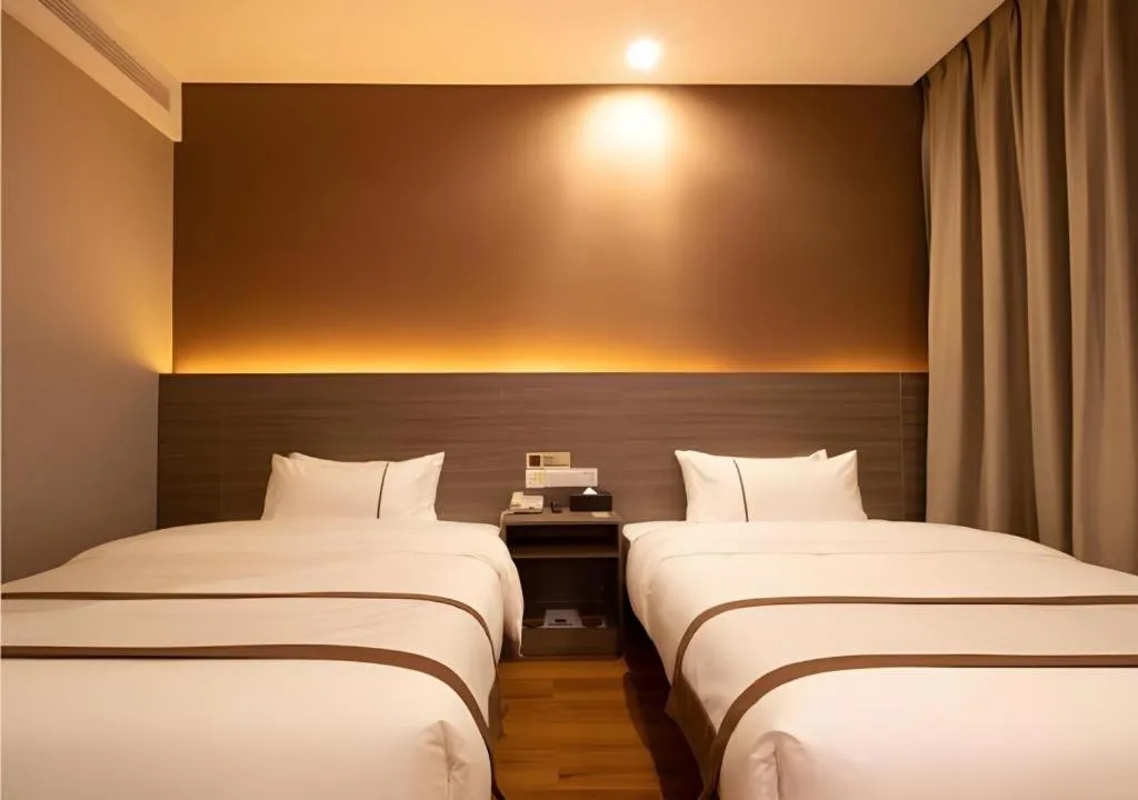 Bed in Jtour Inn Wuxi Meiyuan Kaiyuan Temple Metro