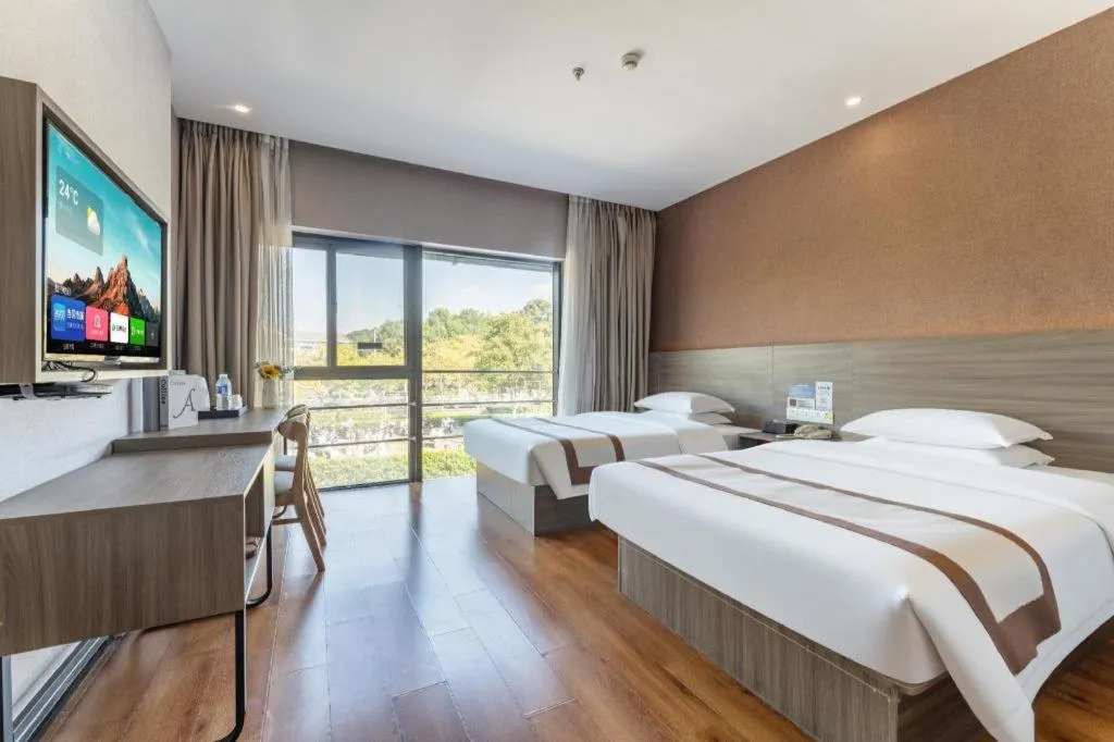 Bed in Jtour Inn Wuxi Meiyuan Kaiyuan Temple Metro