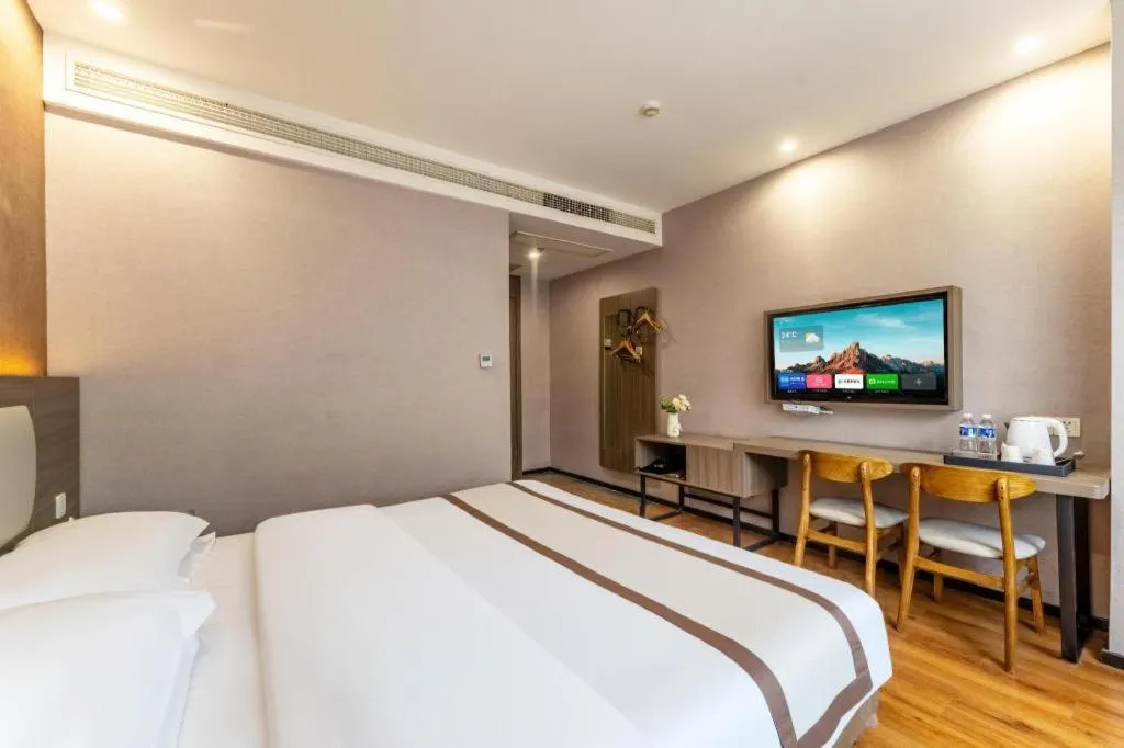 Bed in Jtour Inn Wuxi Meiyuan Kaiyuan Temple Metro