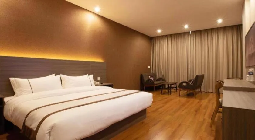 Bed in Jtour Inn Wuxi Meiyuan Kaiyuan Temple Metro