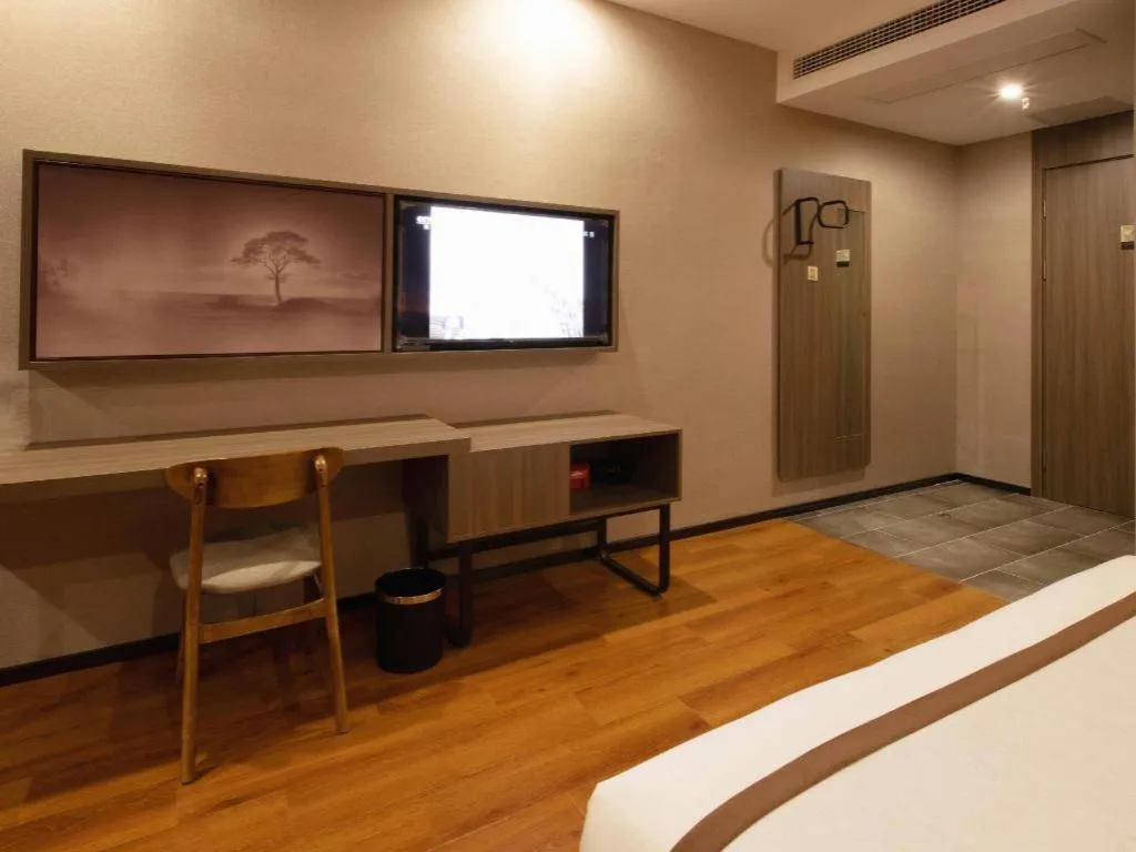 Bed in Jtour Inn Wuxi Meiyuan Kaiyuan Temple Metro