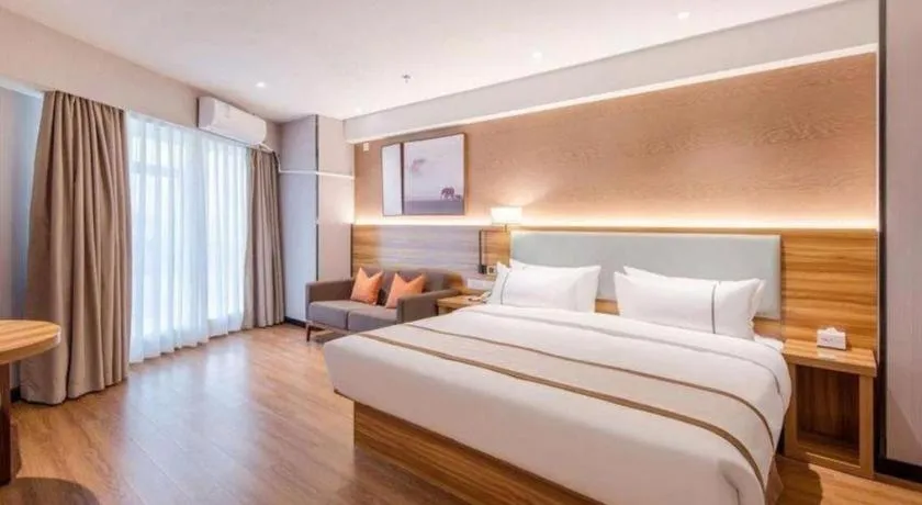 Bed in Jtour Inn Wuxi Meiyuan Kaiyuan Temple Metro