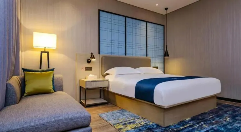 Bed in Echarm Hotel Guiyang Longdongbao International Airport Outlets