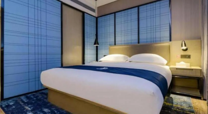 Bed in Echarm Hotel Guiyang Longdongbao International Airport Outlets